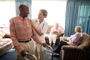 a group of seniors living in Assisted living and memory care communities interact with nurses