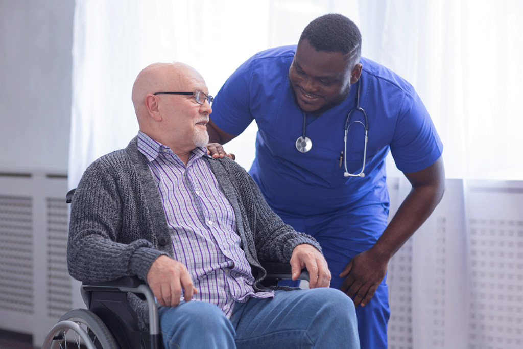 One of many senior living workers helping a senior