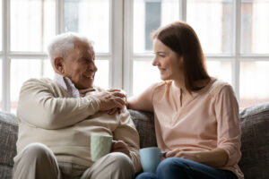 Two people discuss the costs of senior living