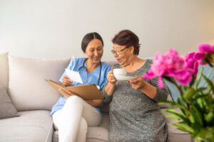 senior living community representatve explaining to prospective client what separates buckner calder woods memory care program from others